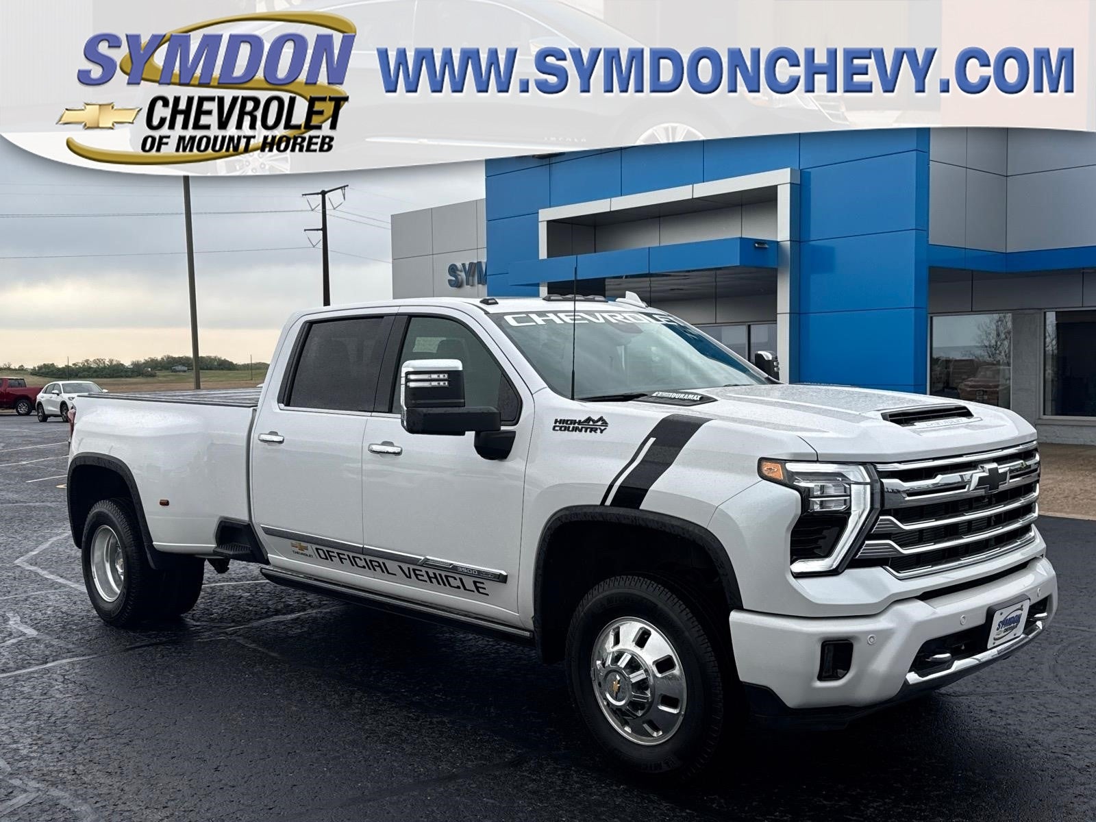 2025 Chevrolet Silverado 3500 HD High Country DRW in Iridescent Pearl Tricoat — front three-quarter view