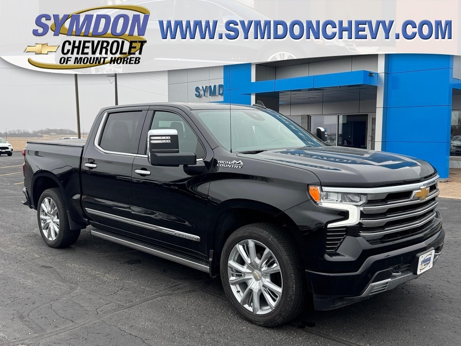 2025 Chevrolet Silverado 1500 High Country in Black — front three-quarter view