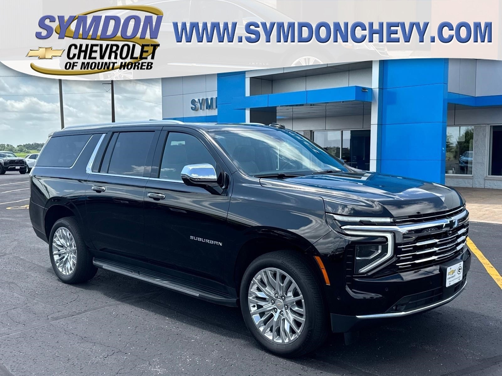 2026 Chevrolet Suburban Premier in Black — front three-quarter view