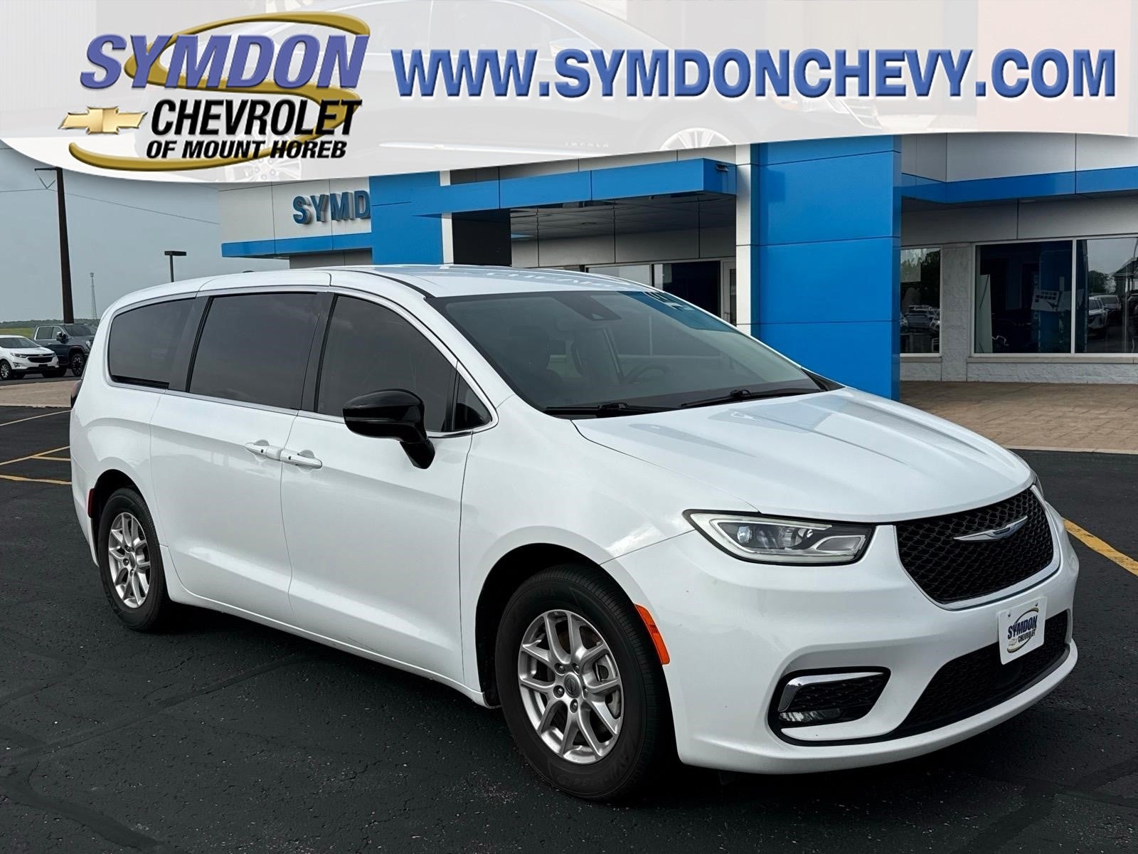 2024 Chrysler Pacifica Touring L in White — front three-quarter view