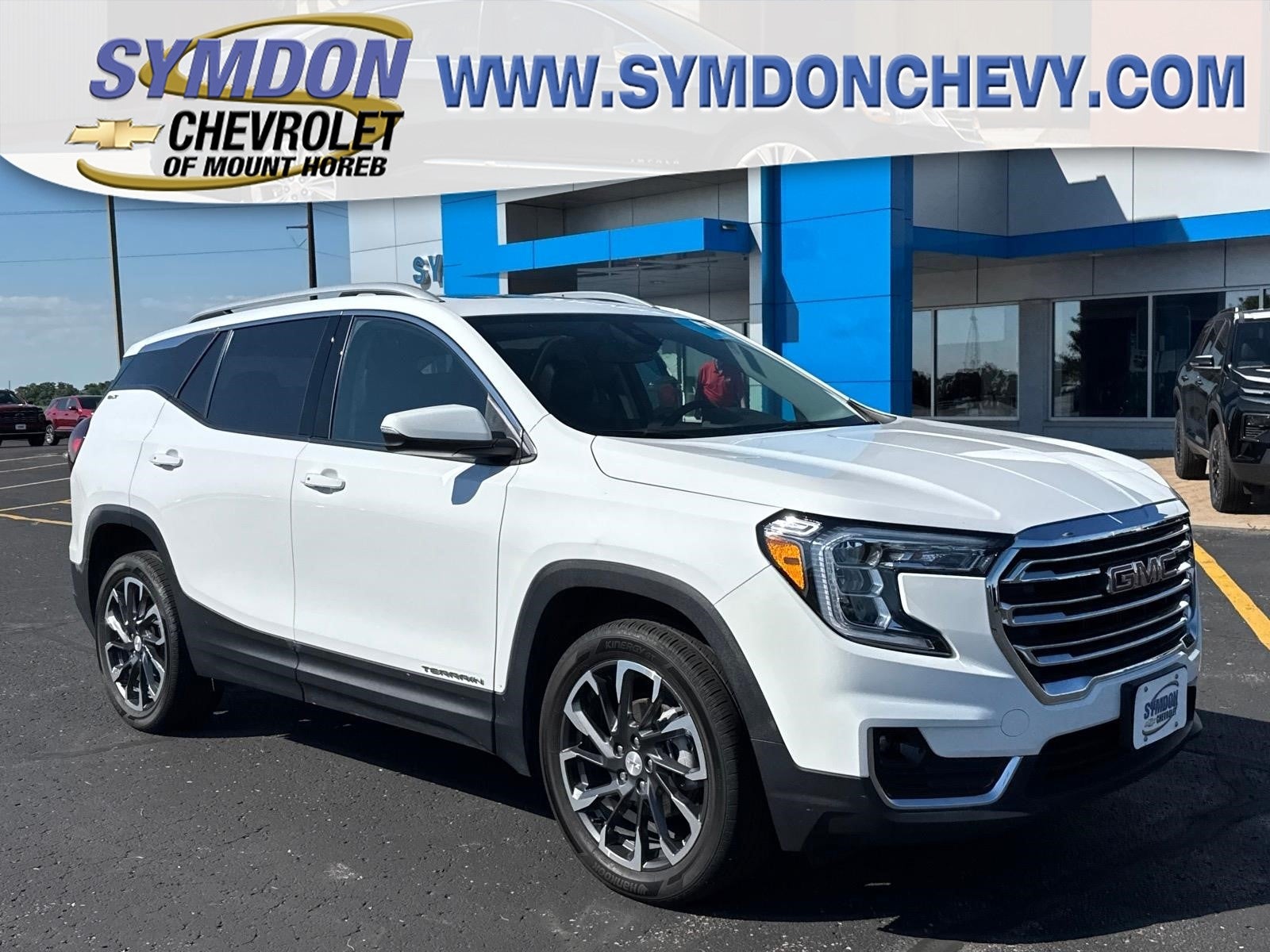 2024 GMC Terrain SLT in Summit White — front three-quarter view