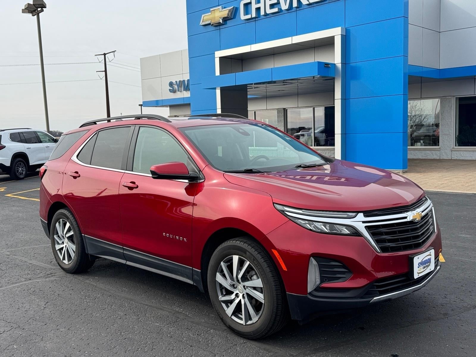 2024 Chevrolet Equinox LT in Radiant Red Tintcoat — front three-quarter view