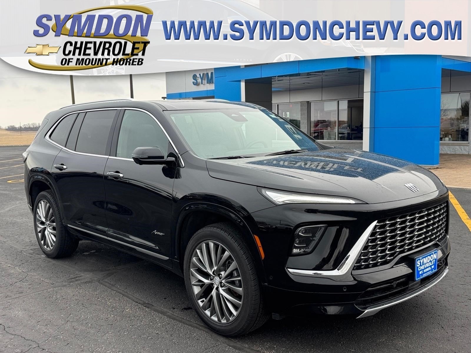 2025 Buick Enclave Avenir in Ebony Twilight Metallic — front three-quarter view